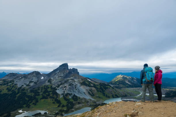 istock Couple embracing nature 902294788