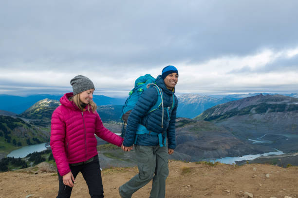 istock Couple embracing nature 902296394