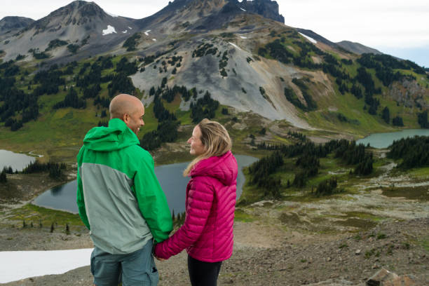 istock Couple embracing nature 902296966