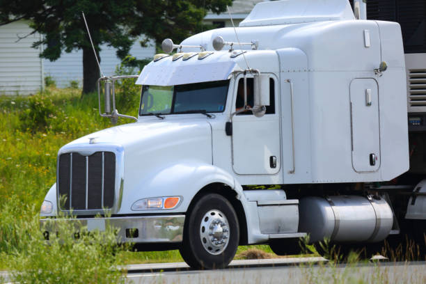istock Semi-truck on a highway 902300380
