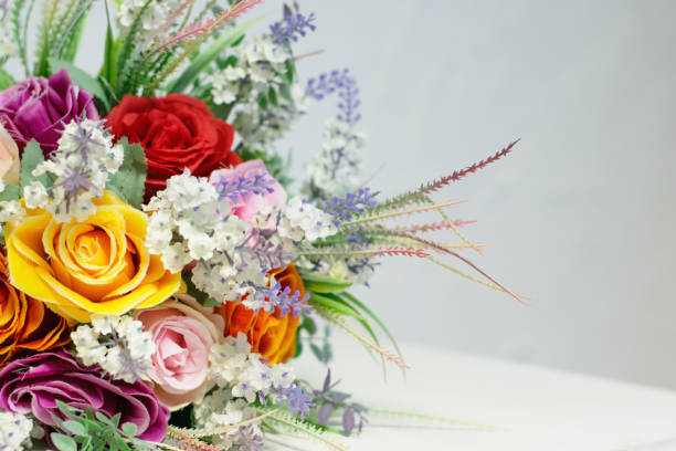istock colorful bouquet of artificial flowers on white background 902304012