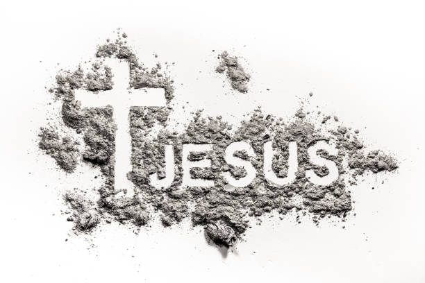 istock Word Jesus and christian cross or crucifix made in ash 902307528