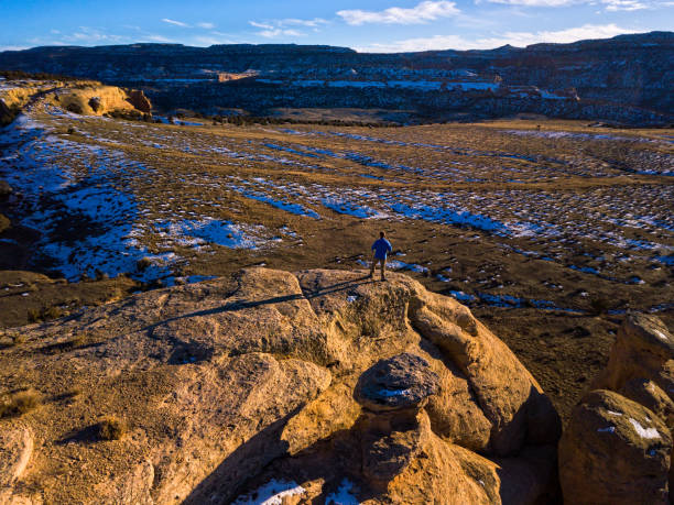 istock Hiker on Red Rock Canyon ridge  Along Colorado River 902307570