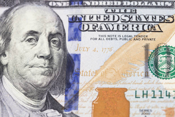 istock Macro shot of one hundred dollars bill 902307702
