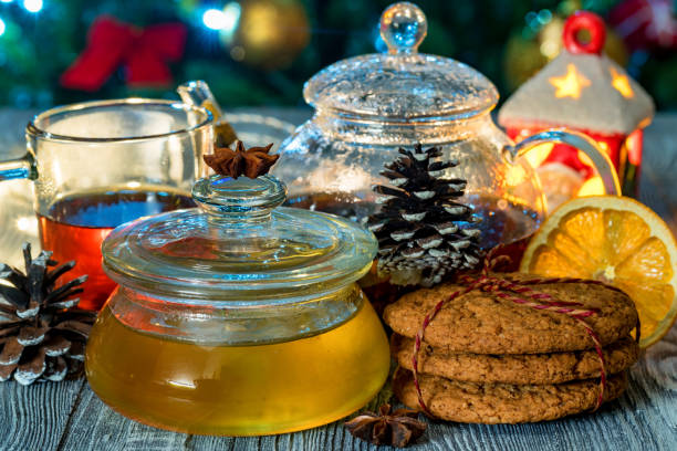 istock Cozy still life with tea, candle light and honey 902307740