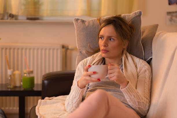 istock Young  woman enjoying in coffee time at home 902307766