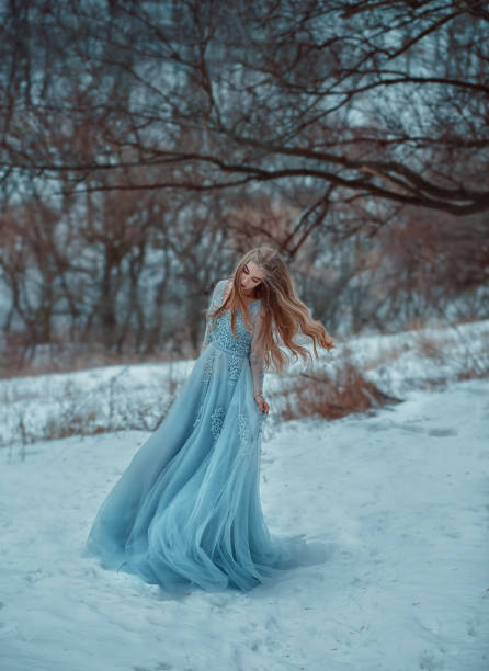 istock Lady in a luxury lush blue dress 902313602