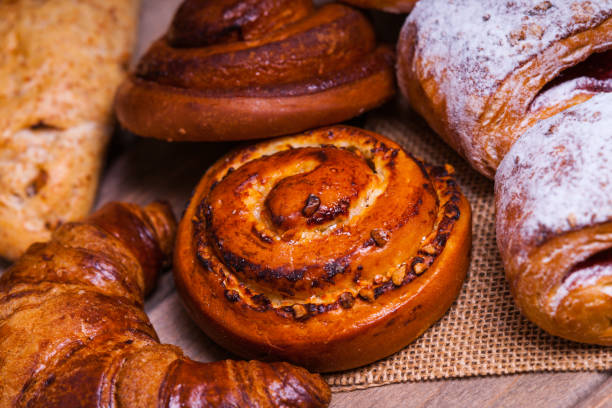 istock Fresh baked homemade buns and rolls 902316476