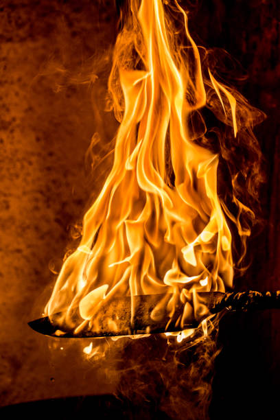 istock Close-up of Blacksmith Tempering a Knife 902322746