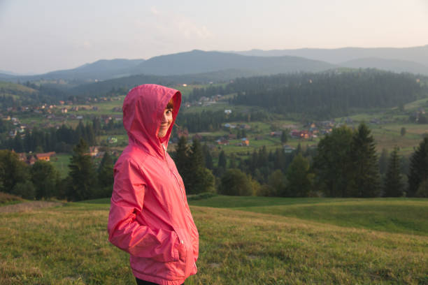 istock Journey. The girl walks in the mountains. 902335270