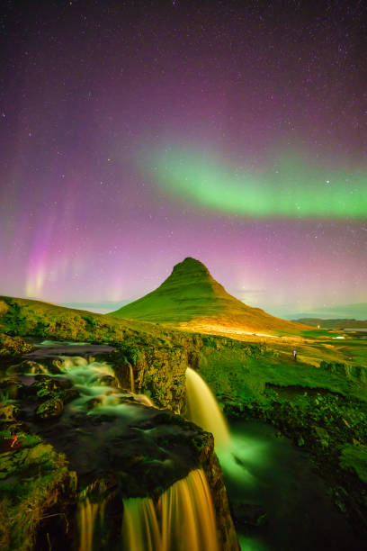 istock northern light over Kirkjufell mountain 902340712
