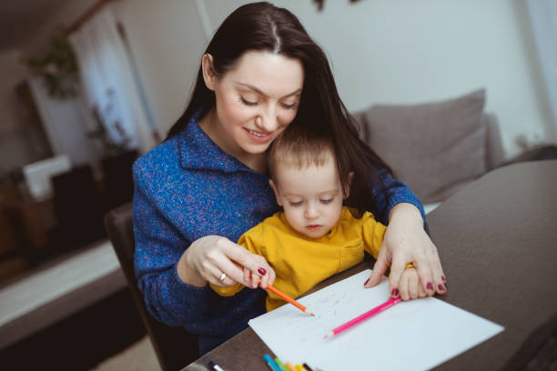 istock Enjoying painting with son 902347106