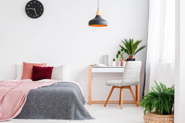 istock Pink and grey bedroom 902351126