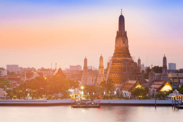 istock Arun temple river front with after sunset sky background 902357240