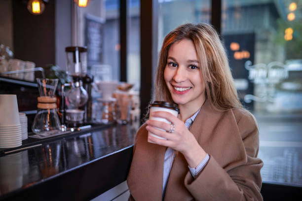 Girl and coffee to go