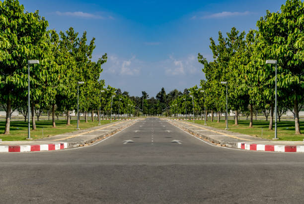 istock Road with red and white curb 902372574