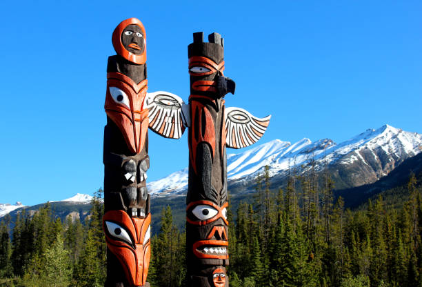 Totem Poles, Icefield Parkway, Jasper, Canada sculptures, tree trunks, sculptures carved from tree trunks, symbols of the indians, indian culture, art, artwork, crafts totem pole stock pictures, royalty-free photos & images
