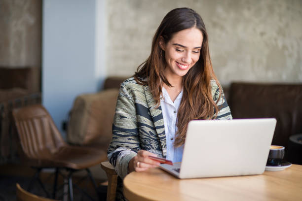 istock Woman shopping online. 902378976