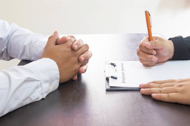 istock Businesswoman explain employment agreement. 902381440