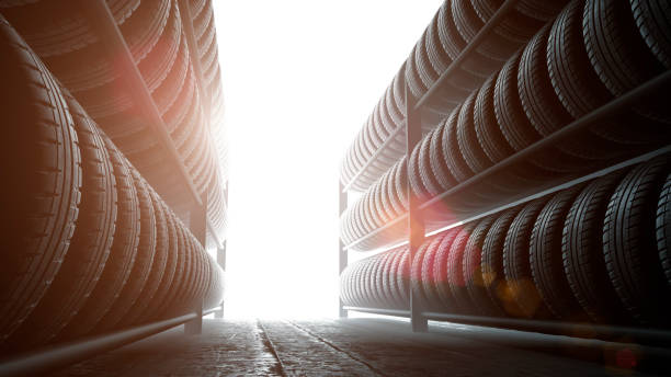 istock 3D illustration, car tires rack in workshop background, back lit 902381830