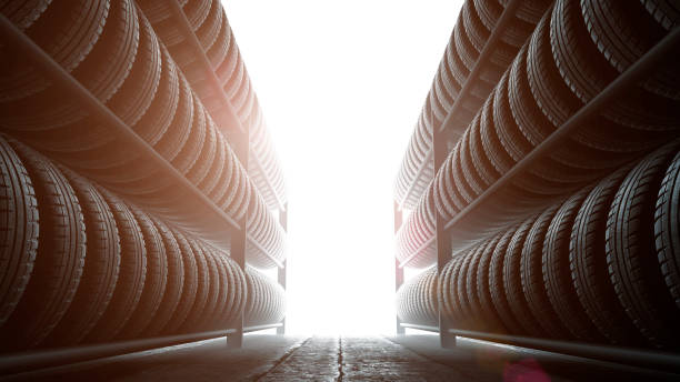 istock 3D illustration, car tires rack in workshop background, back lit 902381836