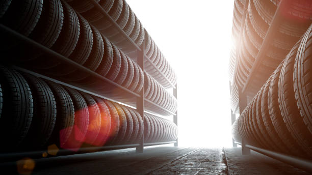 istock 3D illustration, car tires rack in workshop background, back lit 902381838
