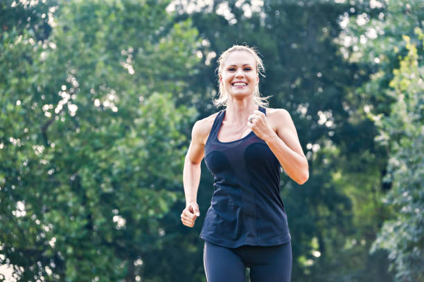 istock young caucasian woman training 902382026