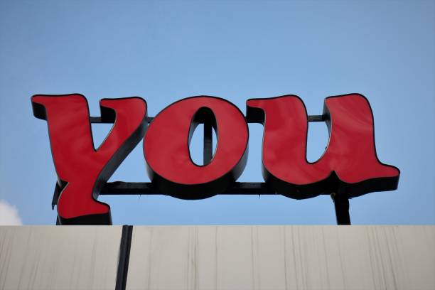 istock Red 'You' Sign on Blue Sky 902388022