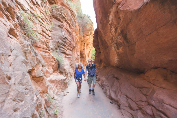 istock Older Couple Hikes Together in Utah 902401858