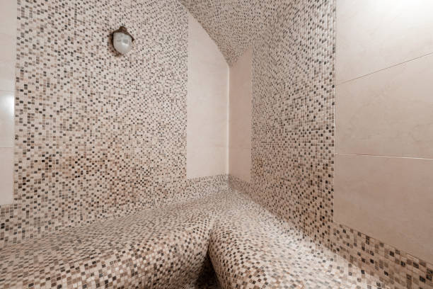 istock Interior of a Turkish bath with ceramic tile in roman style. Spa centre or hotel. 902411236