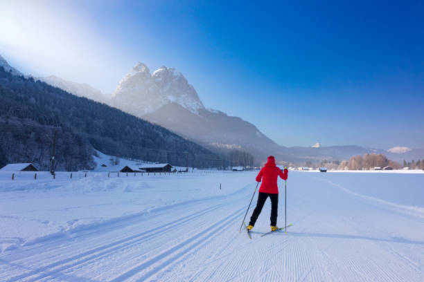 Cross Country Skiing towards Mount Zugspitze Winter, Zugspitze Mountain, Mountain, Bavarian Alps, Mountain Range, Skilanglauf zugspitze stock pictures, royalty-free photos & images