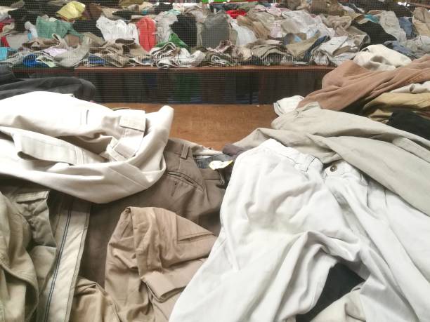 istock The Secondhand clothes in the market 902421414