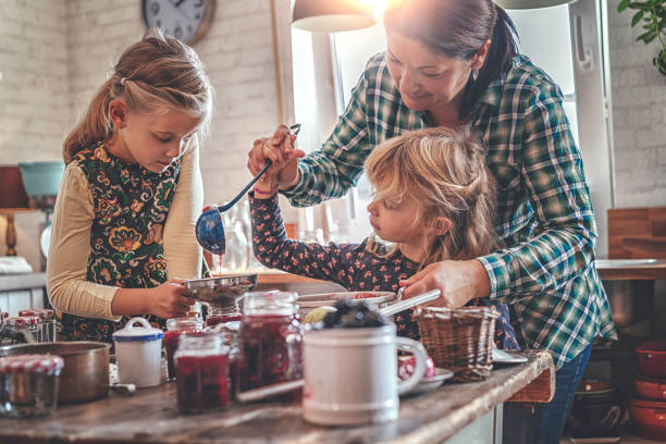 Preparing Homemade Berry Jam and Canning in Jars