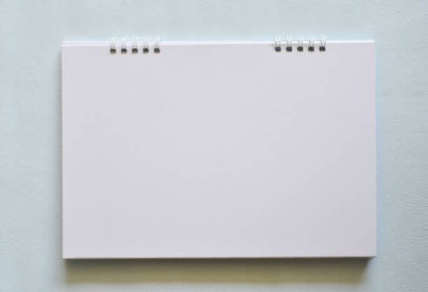 istock Close up white calendar on white background. 902428828