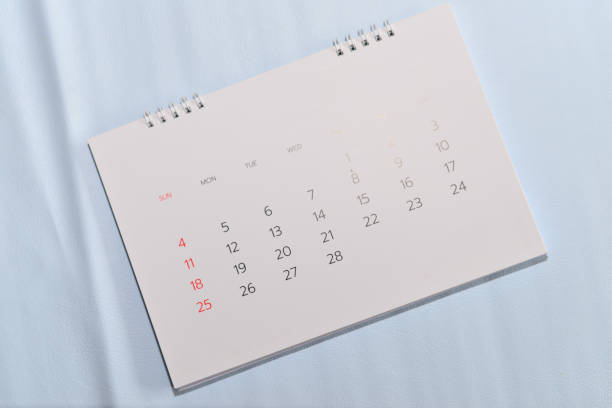 istock Close up white calendar on white background. 902428906
