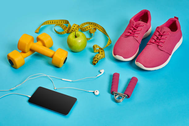 istock Sneakers, centimeter, green apple, weight loss, running, healthy 902429582
