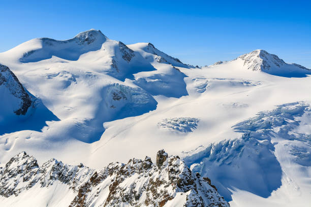 istock Mountains covered with snow in ski resort of Pitztal, Austrian Alps 902437250
