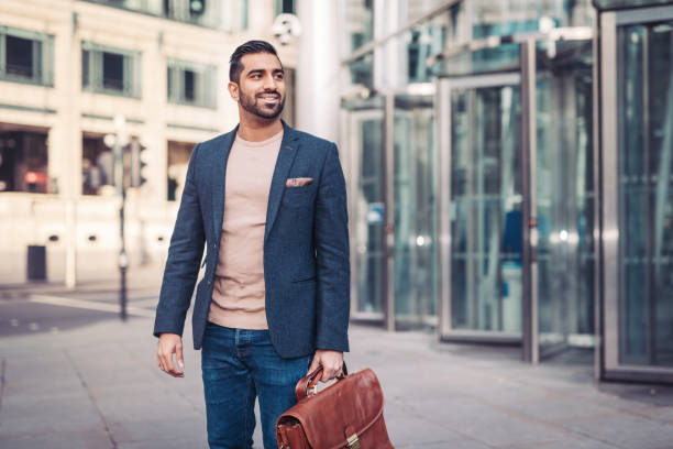 istock Indian lawyer with briefcase 902441440