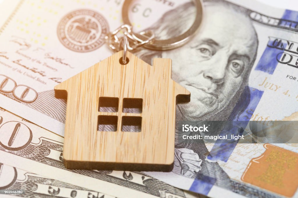 Savings concept. The key ring lies on the money Bank Deposit Slip Stock Photo