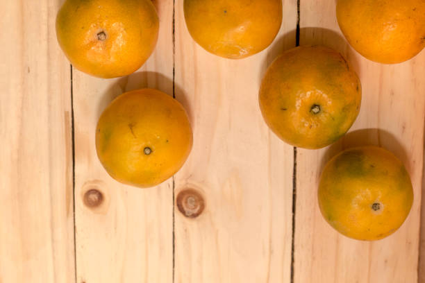 istock tangerine orange on wood 902453166