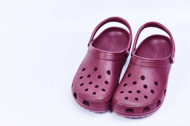 istock Bordeaux sandals on a white background . 902454632