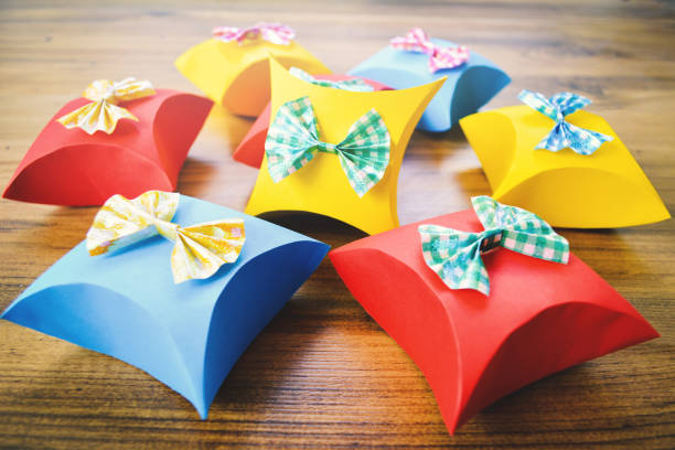 istock Close-Up Of Colorful Gift Boxes On Wooden Table 902460452