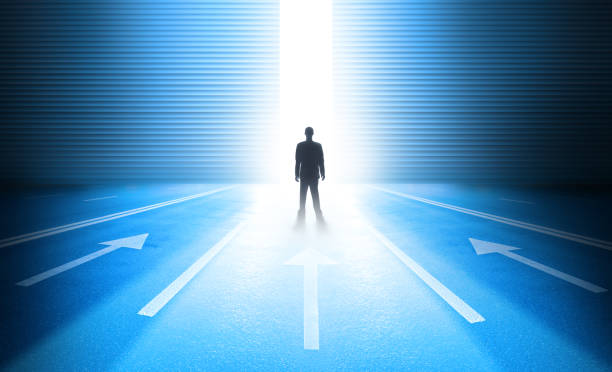 istock Bright future. Man, arrows, open door and beam of light 902469524