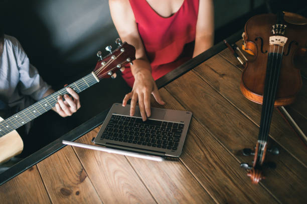 istock online music school play instrumental lessons 902484194