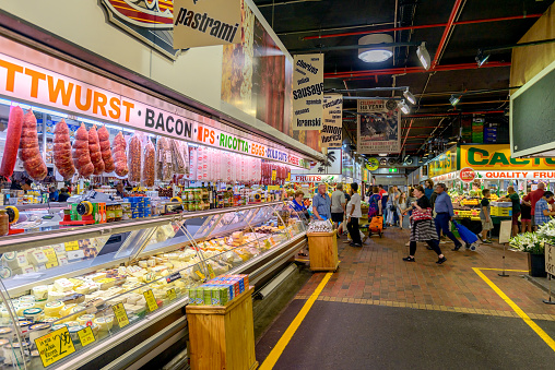 Adelaide, Australia - January 13, 2017: People shopping at Adelaide Central Market on a weekend. It is a popular tourist attraction in the CBD area and the most visited place in South Australia.