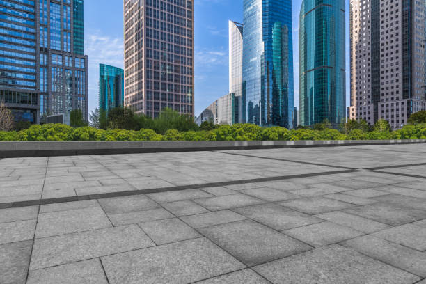 istock Empty brick floor with city skyline background 902484984