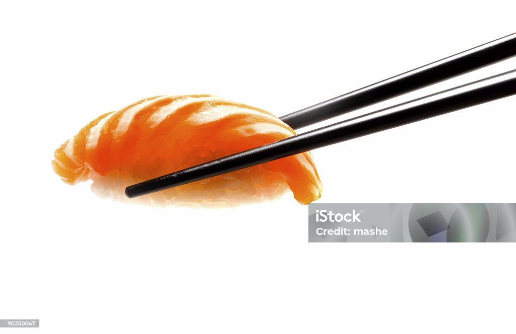 Sushi con le Bacchette cinesi scatto su bianco - Foto stock royalty-free di Alimentazione sana