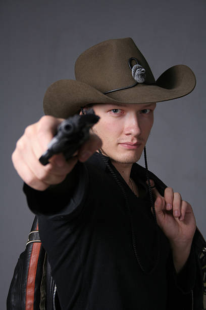 istock Bah-bah. Cowboy threatens revolver. 90250316