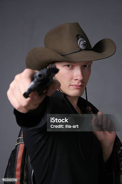 Bahbah Cowboy Threatens Revolver Stock Photo - Download Image Now - Adult, Aiming, Black Color