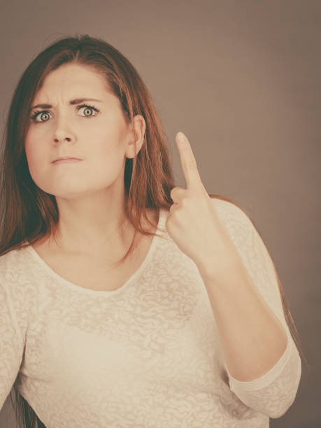 istock Attractive woman having angry frustrated face expression 902506156